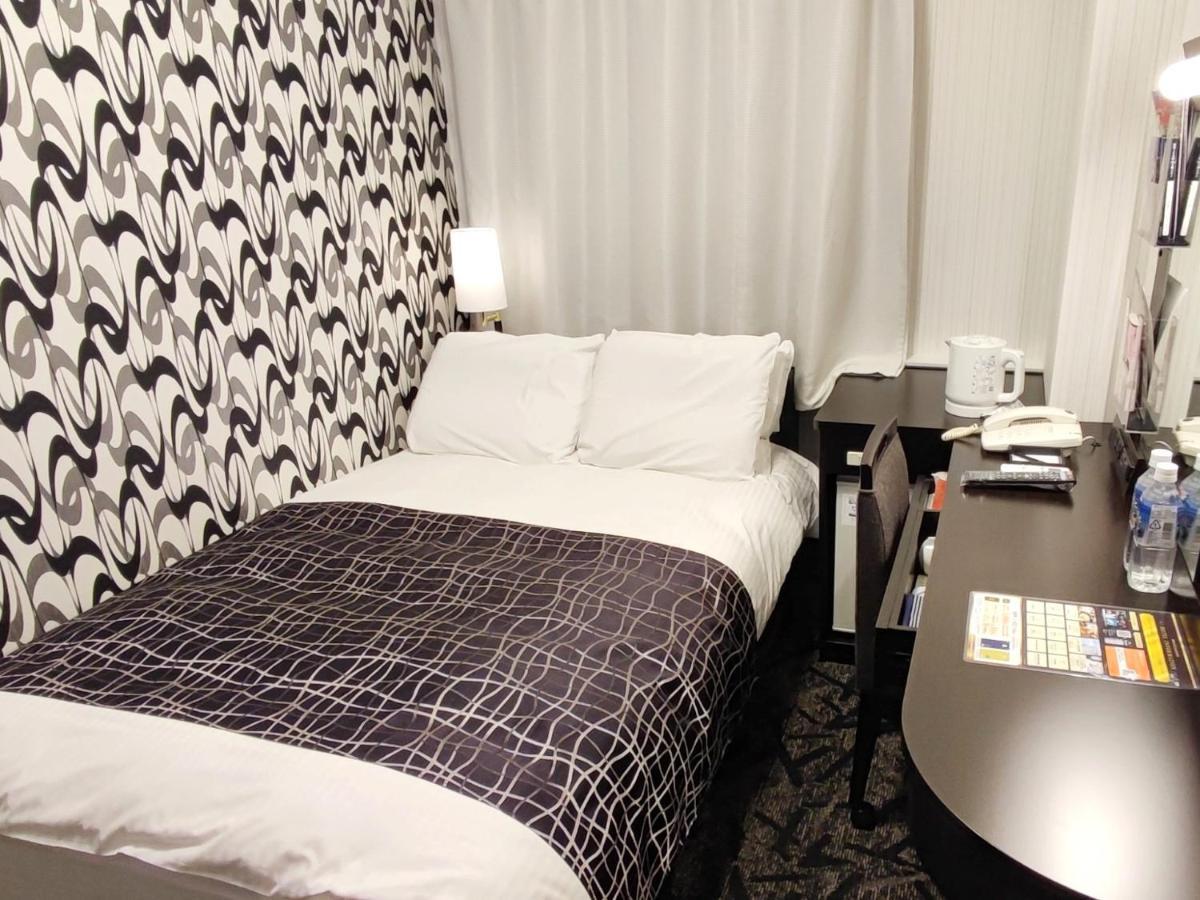 Apa Hotel Niigata Bagian luar foto