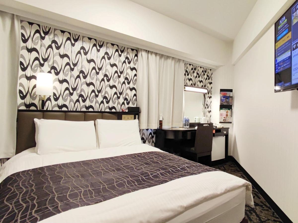 Apa Hotel Niigata Bagian luar foto