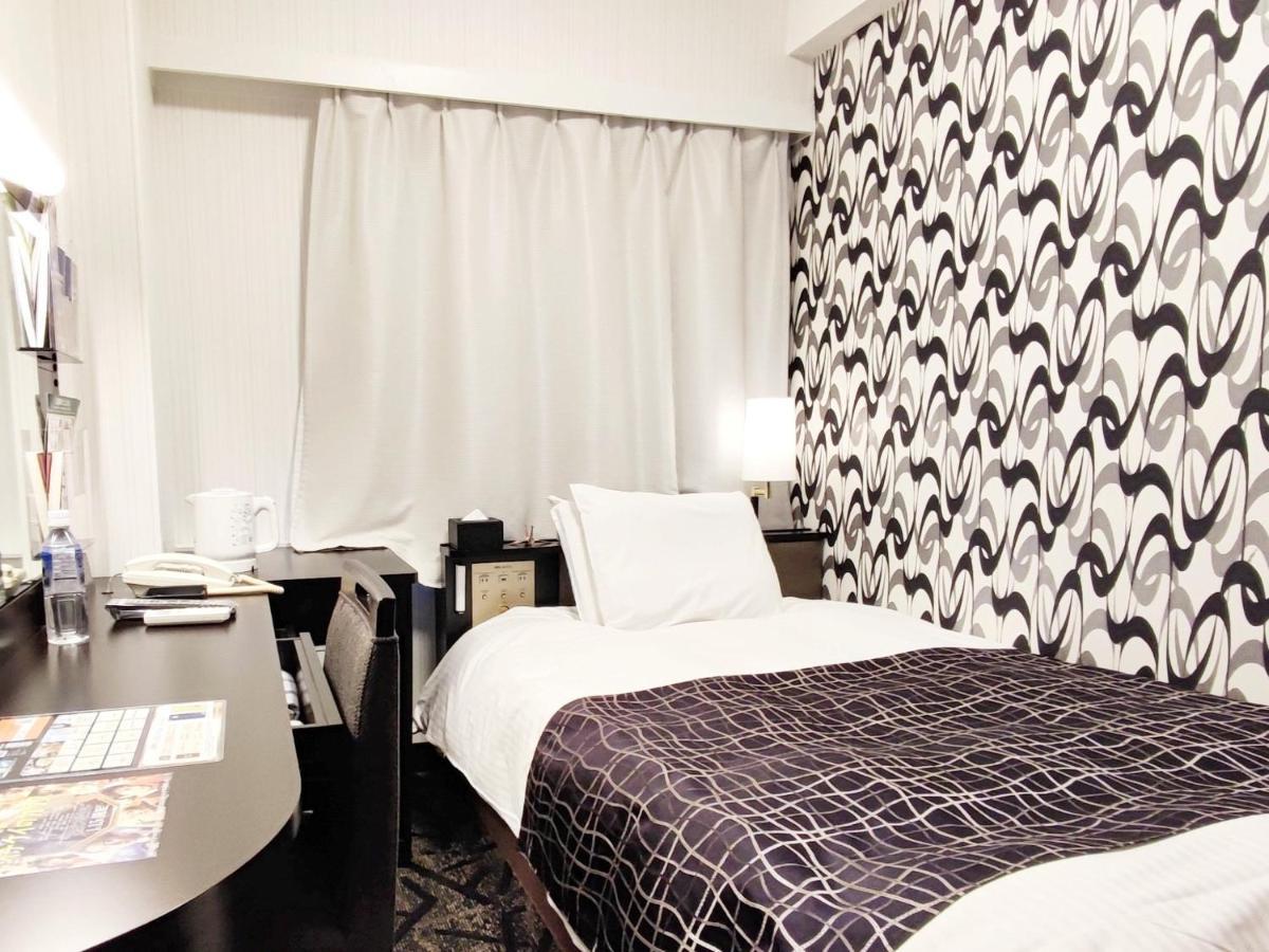 Apa Hotel Niigata Bagian luar foto